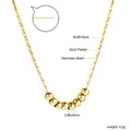 Detail of gold plated stainless steel bead necklace showing 45+5cm length and size specs - 7 Sliding Round Beads Gold Necklace (NE2D1101G)
