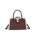 Brown leather and suede handbag with plush fleece trim and a gold pyramid metal lock - Brown