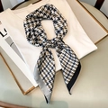Classic houndstooth tie-dye silk scarf displayed on a white tee in a gold frame - Faux Silk / Black and Gray
