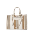 Canvas tote bag with brown vertical stripes, leather handles, and adjustable shoulder strap - White