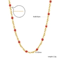 Detailed view of golden stainless steel chain with red beads and 40+5cm length detail - Red Enamel Style (NE2D780EG)