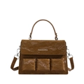 Deep brown box-shaped handbag with unique wrinkled texture and silver hardware details - Brown