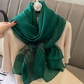 Elegant dark green silk blend pashmina scarf with subtle golden shimmer and silky texture - Green