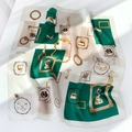 Detail of silk square scarf showing vintage portrait prints and elegant geometric patterns - Green (Illustrations)