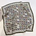 Detail of silk square scarf featuring colorful horse print and striped geometric patterns - Neckerchief / Army Green Edge