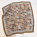 Detailed view of silk square scarf featuring elegant horse patterns and brown borders - Neckerchief / Natural With Coffee Edge
