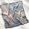 Detailed close-up of paisley pattern silk scarf with elegant stitched hem and satin finish - Square Scarf / Paisley Pattern-Khaki Blue