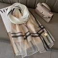 Elegant long silk blend scarf with beige and black contrast stripes on a grey backdrop - Geometric Texture Rice Khaki