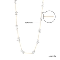 Gouden ketting met onregelmatige witte steentjes en detail van de verlengketting - Grote Witte Steen Stijl(NE2E080AG)
