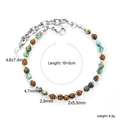 Detalle de pulsera de cuentas con piedras azules, cierre y colgante de luna - Turquesa Ojo de Tigre Cuentas Luna (BR28570MS)