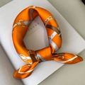 Orange silk scarf with classic chain and belt prints in a stylish knotted display - 53x53cm / Orange