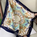 Baroque silk scarf in navy and mint green with golden chain harness pattern on a chair - 53x53cm / Navy Blue