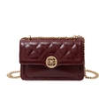 Quilted burgundy leather crossbody bag with gold chain strap and floral buckle - Burgundy