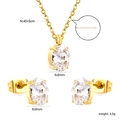 Macro detail of gold stainless steel necklace set with 6x8mm clear oval cubic zirconia stones - Gold Oval Style (SE26360AG)