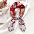 Elegant nautical silk scarf with anchor print and floral accents on satin background - Red