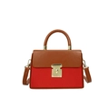 Fashionable box bag featuring brown leather flap and red textured body with gold lock - Red