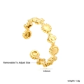 Detail of adjustable gold ring with floral sun disc pattern, 4.6mm wide and 1.8g weight - US 7 / Flower Sun Disc Style (RI164108G)