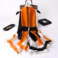 Silk-like long scarf with vibrant orange and black geometric block patterns on handbag - Beige Edge (F-95)