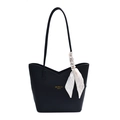 Black pebbled leather tote bag with elegant silk scarf wrap and golden logo detail - Black