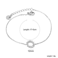 Minimalist silver stainless steel bracelet with a round crystal crown pendant charm - Silver Round Hollow Style (BR27560AS)