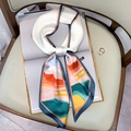 Artistic landscape print skinny silk scarf tied with a pearl accessory on a book - Oil Painting Blue Border