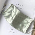 Detailed view of mint green silk mask with triple-fold design and adjustable straps - One Size / Mint Green (KZ-35- Light Green)