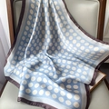 Detail of light blue silk scarf with white polka dots and brown borders on wooden chair - 70x70cm / Polka Dot Blue (W-176)