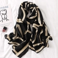 Linen feel scarf with black and yellow geometric color block design in a chic flat lay - Geometric Color Block Stripes (A-276-Black Rice)