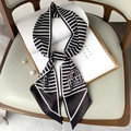 Elegant black and white striped silk scarf with geometric logo on stylish magazine - Style 27 Black OM Stripes