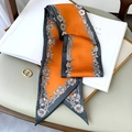 Detail view of a long narrow floral scarf with bright orange and dark grey silk texture - Large Bevel (FX-100-Caramel) / 15*150cm / Caramel color