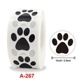 Rolle mit 2,5 cm selbstklebenden schwarzen Hundepfoten-Aufklebern für Bastelarbeiten - 2.5cm Durchmesser