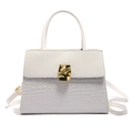 White croc-effect handbag with gold metal clasp and versatile crossbody shoulder strap - White