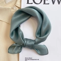 Elegant sage green pure silk square scarf with a satin finish tied on a beige shirt - 53*53cm / Blue