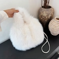 Elegant white faux fox fur bucket bag with a slim leather shoulder strap for winter - White
