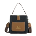 Minimalist bucket bag in black pebble leather with brown pocket and wide woven strap - Black