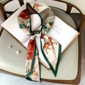 Equestrian pattern skinny silk scarf in dark green and burgundy tied on a magazine - Equestrian Print Green (FX-107-Green)