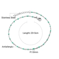 Dettaglio della cavigliera in acciaio inossidabile con perline verdi e lunghezza 23+3cm - Catena d'argento con perline color verde acqua