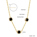 Detail of gold plated stainless steel necklace showing 42cm length and 8.2mm black charms - Black Cat's Eye Necklace (NE2B150BG)