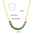 Collana a catena serpente in acciaio dorato con nove zirconi verdi di forma rotonda - Collana d'Oro (NE29420JG)