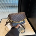 Brown monogram crossbody bag with gold chain and adjustable letter print strap - Brown