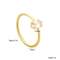 Detail view showing a marquise-cut clear zircon stone on a slim 1.5mm golden band - US 6 / Marquise Zirconia Style (RI165606-8G)