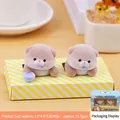 Cute lavender flocked otter figurines for computer screen and desktop decoration - Pink Purple
