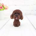 Close-up of deep brown resin teddy dog figurine with realistic bionic hair texture - Teddy Brown