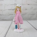 Detail of cute resin girl figurine with pink dress and white rabbit in hand - Pink A