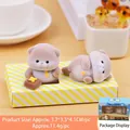 Set of two flocked otter figurines in standing and lying poses with original gift box - Hungry And Spacing Out Style