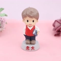 Chinese style boy student figurine cake topper holding a book on Peking University base - Male Student Style (9027)