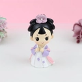 Close-up of a cute Chinese princess cake topper with purple flowers and resin details - Purple Dress Style A