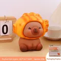 Cute Capybara Piggy Bank wearing orange Taiyaki hat for home decor 16.8x12.1x16cm - Taiyaki Capybara
