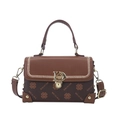 Sac à main vintage en cuir marron avec imprimés monogrammes et boucle D dorée - Lettres Marron