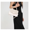 Detail of cream white leather and woven texture mix handbag featuring metal buckle - White